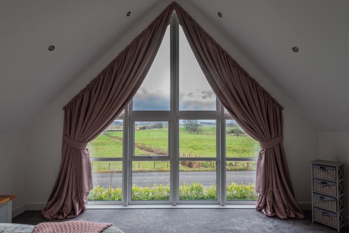 Apex, angled, arched windows – we all love them but how do you hang curtains?